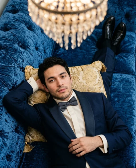Tuxedo on Sapphire Velvet Sofa 5