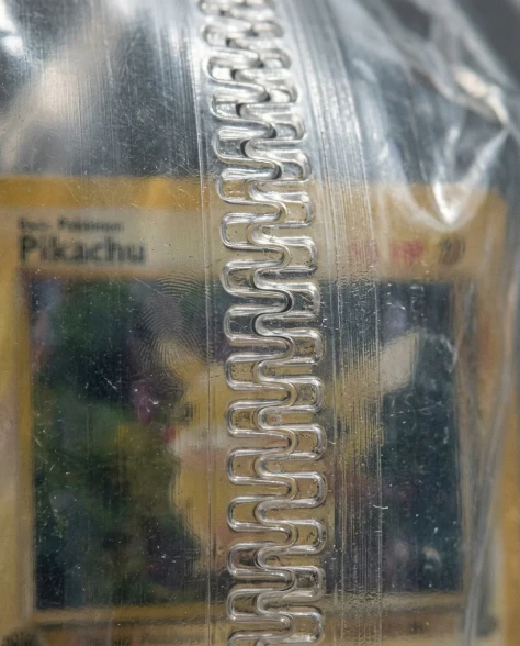 Collectible Card in Transparent Zip Bag Macro Shot 3